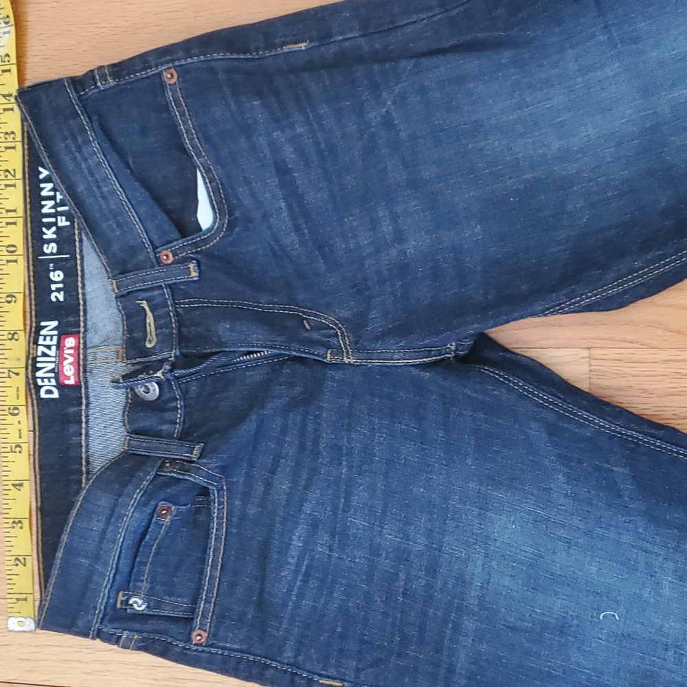 Levi's 216Skinny Fit, Blue with some disressing.Straight leg. New Condition.